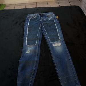 Dolce&Gabbana Distressed Blue Denim Jeans with Biker-Style Stitching